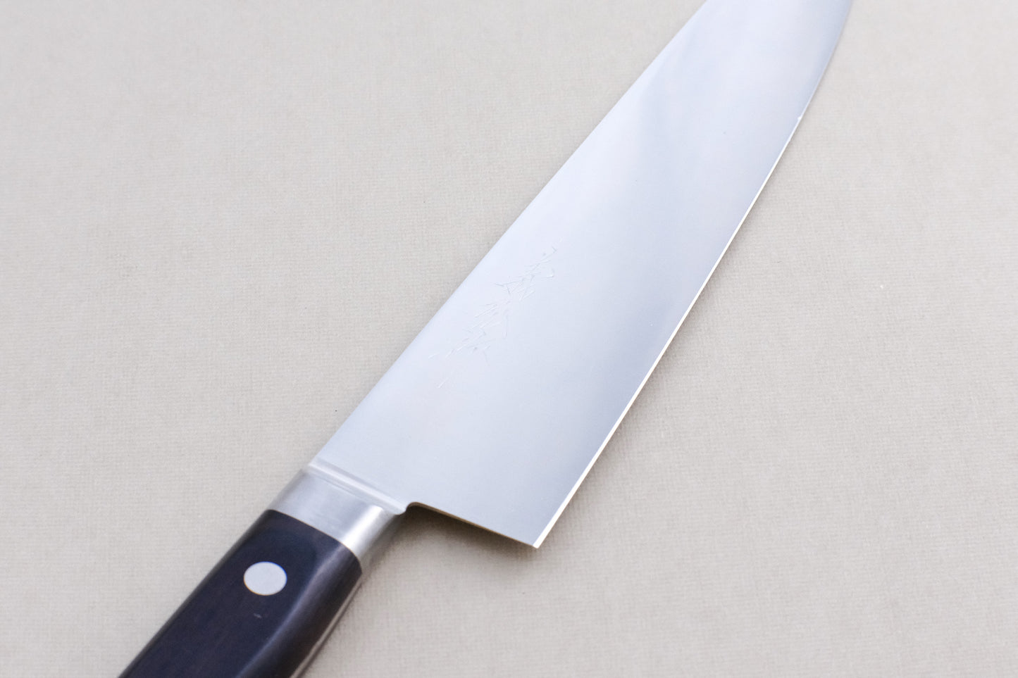 Yamawaki 8A stainless steel gyuto 240 with a pakka handle