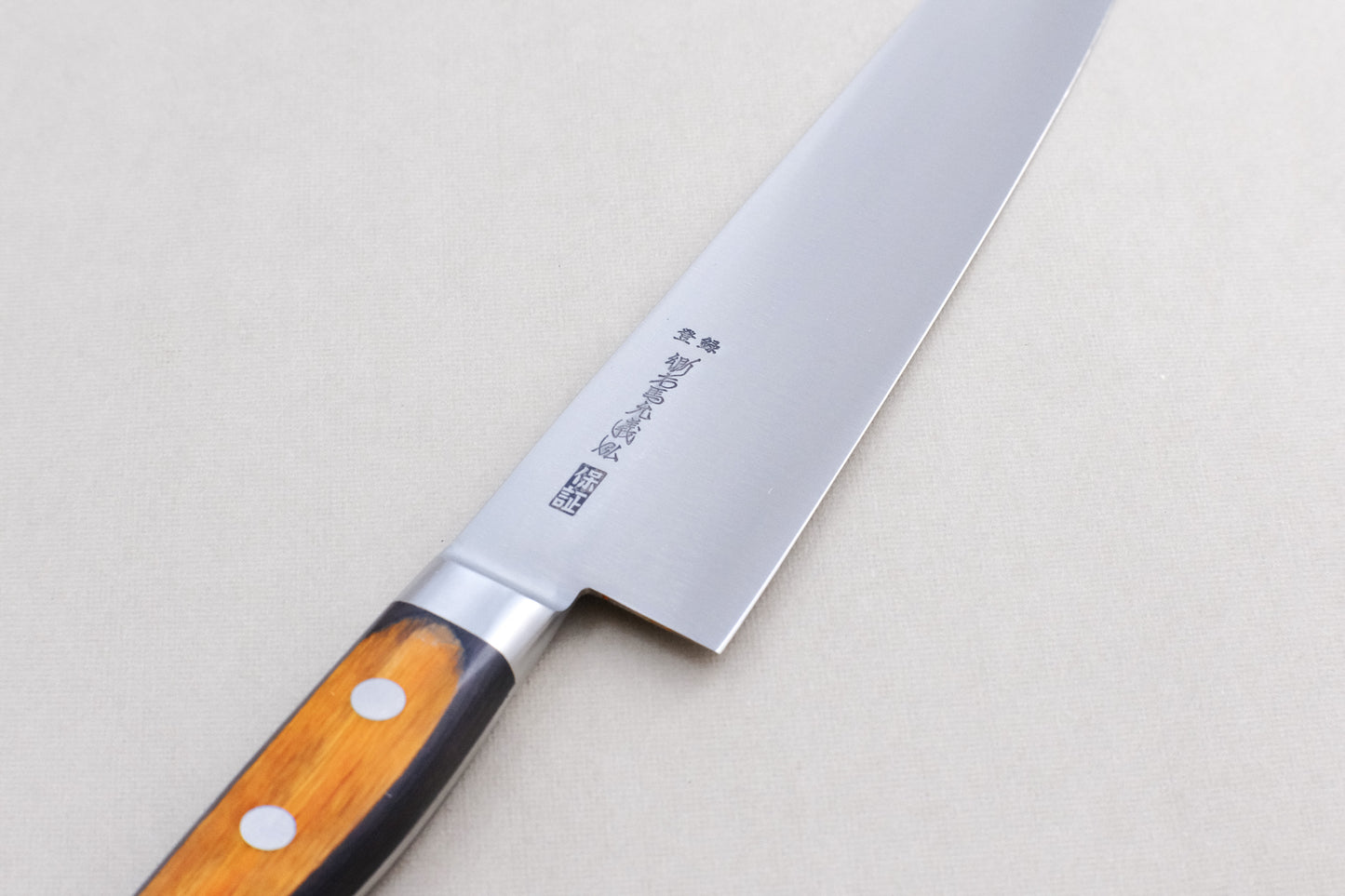 Yamawaki SK4 gyuto 240 with a pakka handle