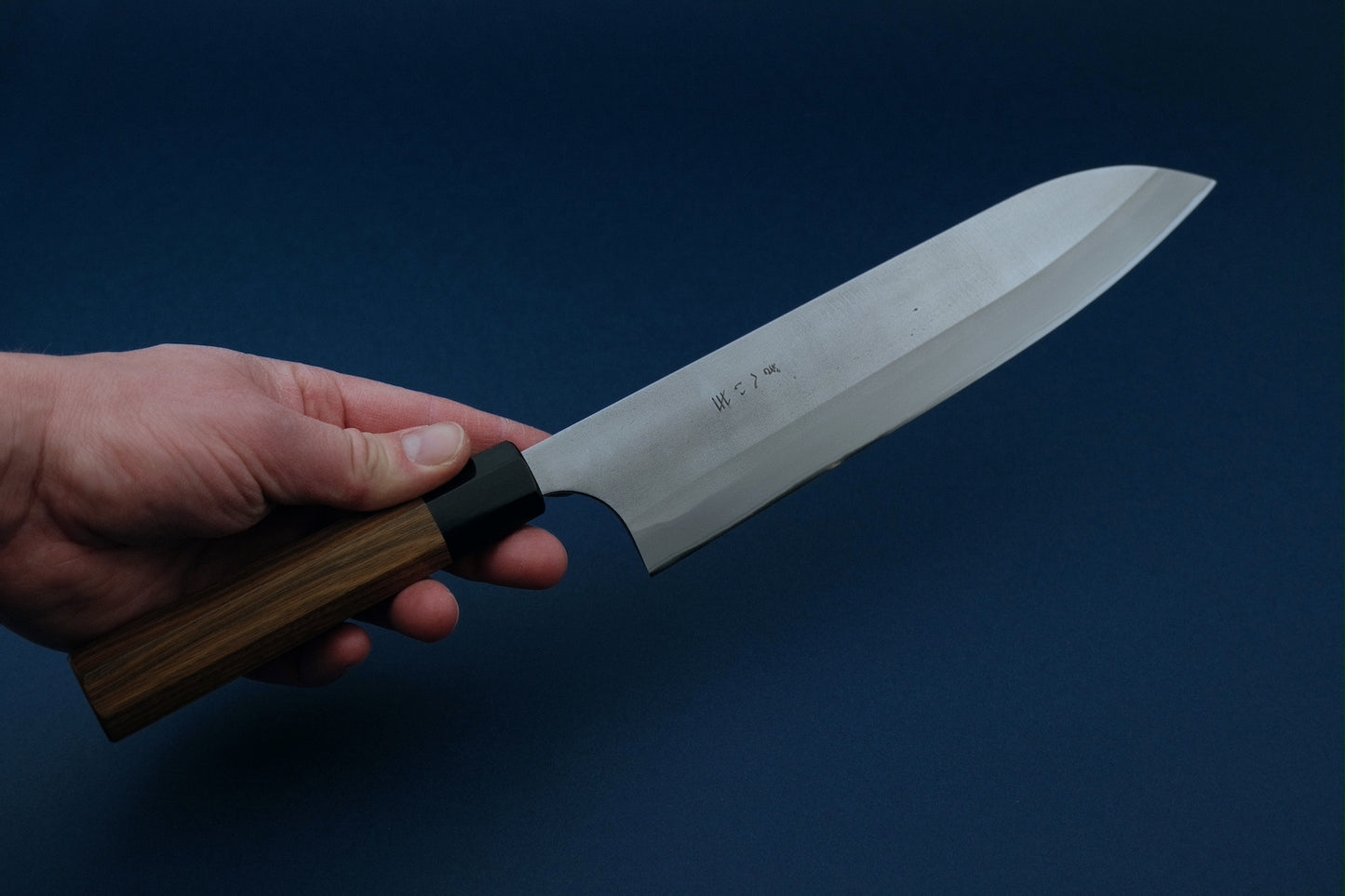 Gihei stainless clad aogami 2 nashiji gyuto with a palo santo handle and buffalo horn collar 240 mm