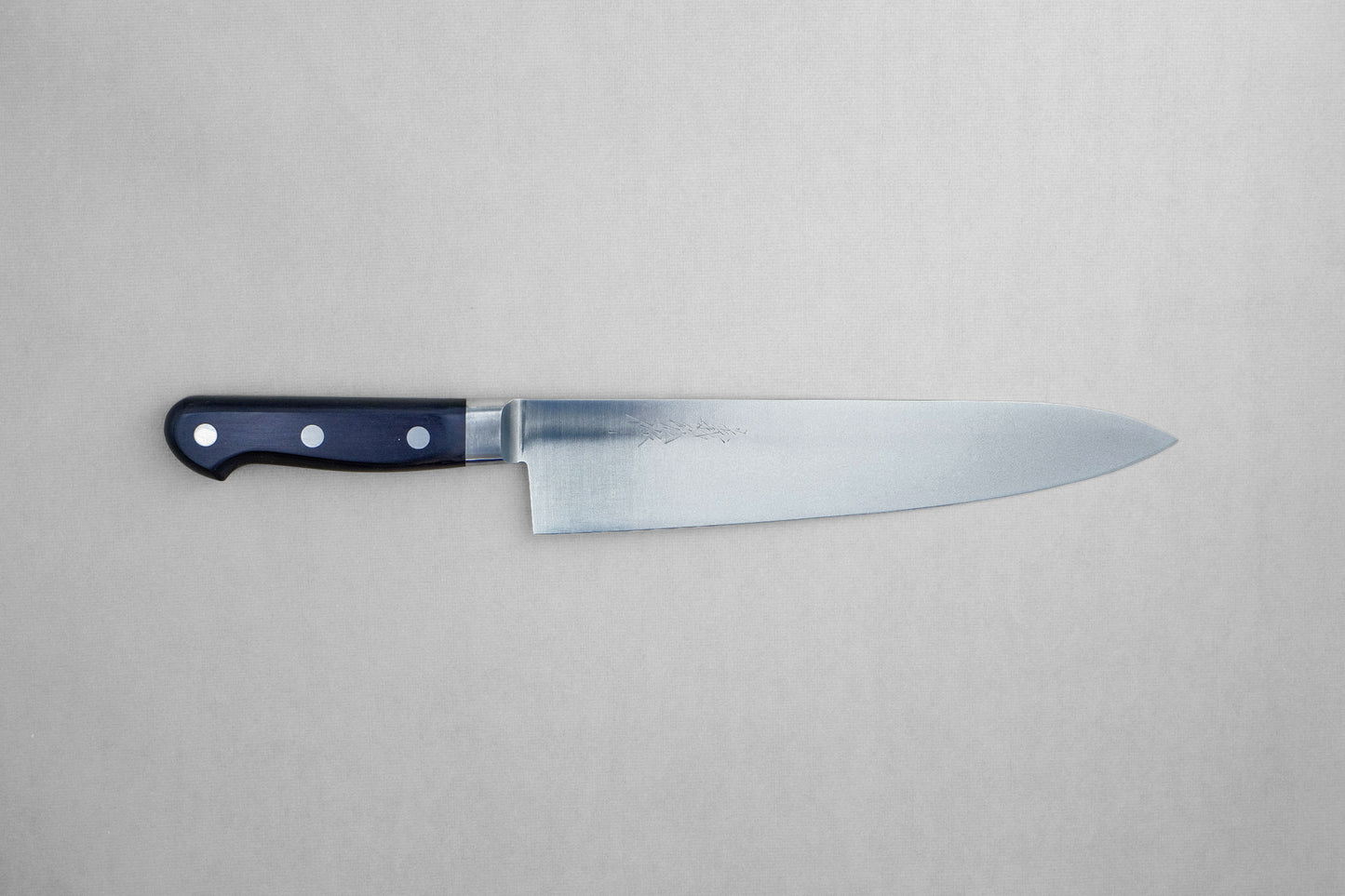 Yamawaki 8A stainless steel gyuto 240 with a pakka handle