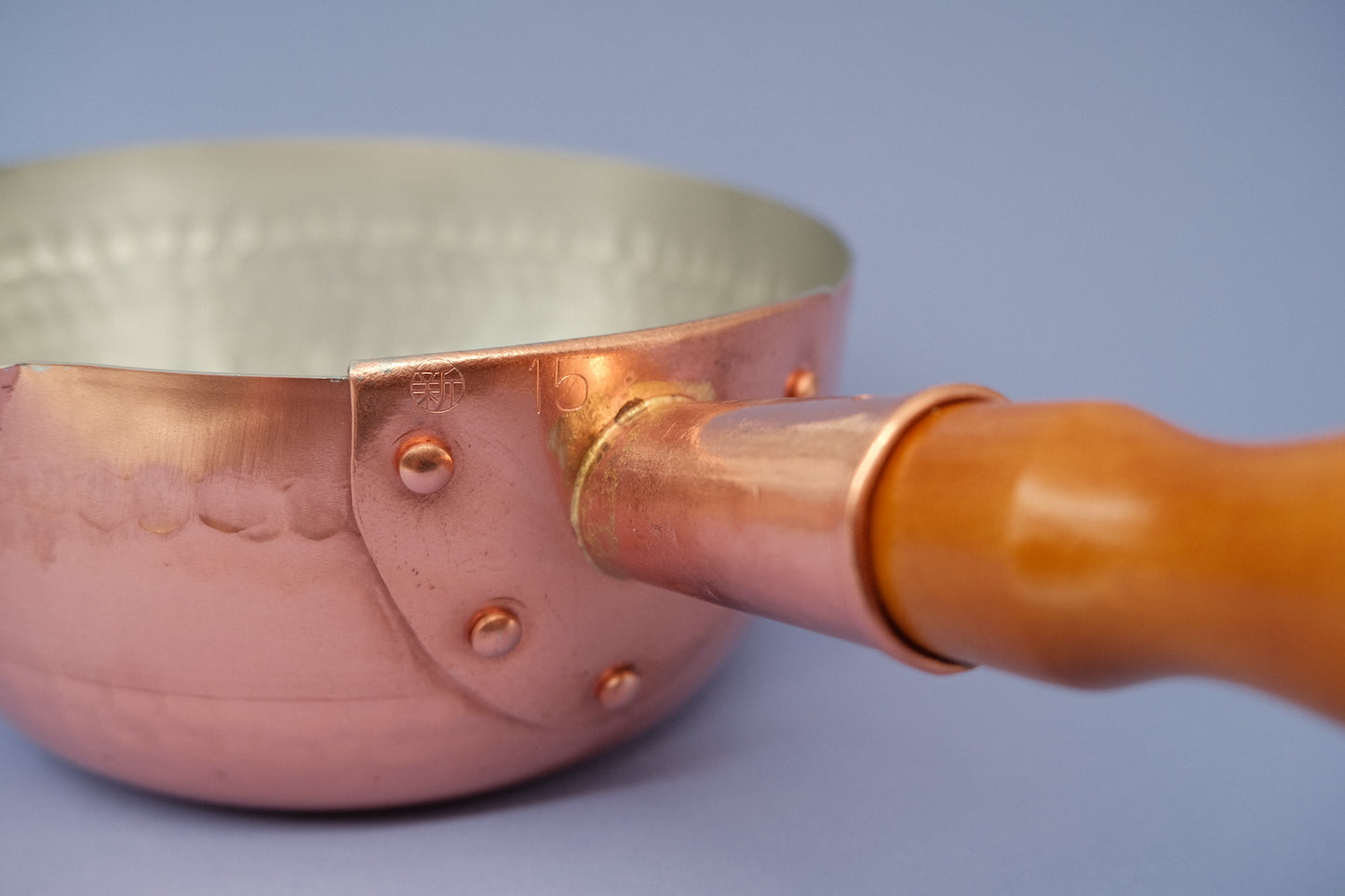 Yukihira sauce pan made of tinned copper with a wooden handle