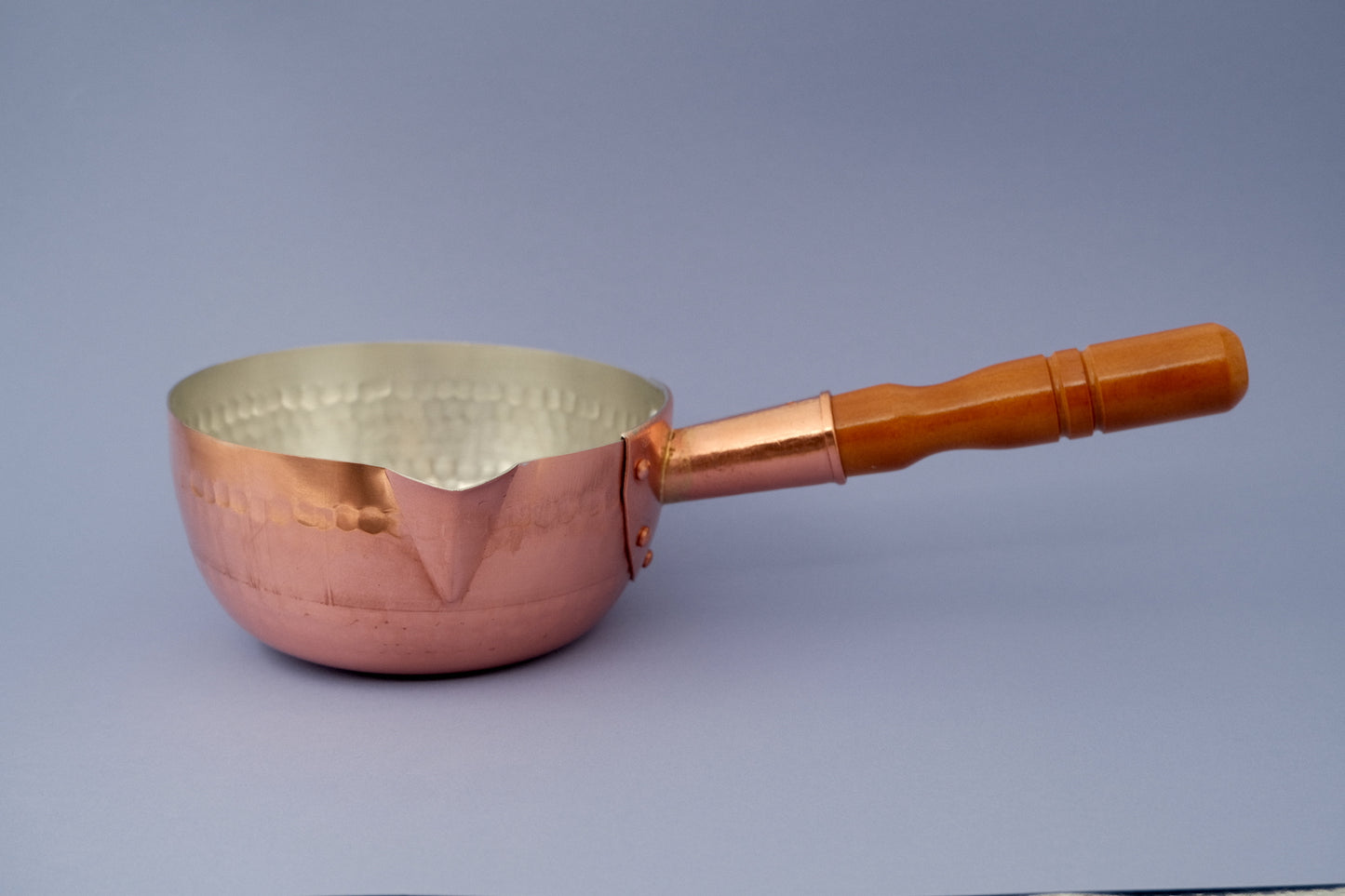 Yukihira sauce pan made of tinned copper with a wooden handle