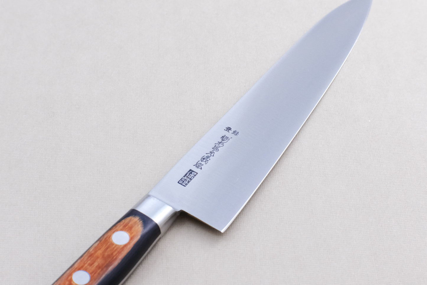 Yamawaki SK4 gyuto 210 with a pakka handle