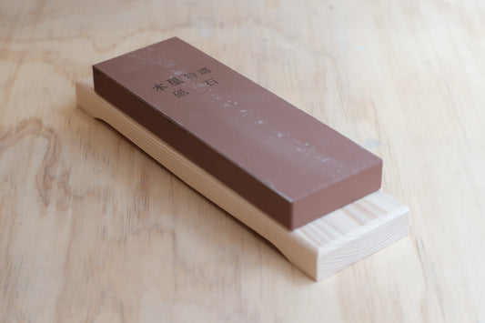 Aluminum oxide whetstone 1000 grit on a wooden base