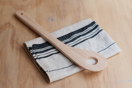 Stirring spatula with hole made of hinoki wood