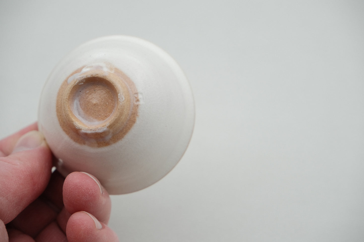 Azmaya Hagi ware sake cup with a white glaze made at the Oya kiln in Yamaguchi