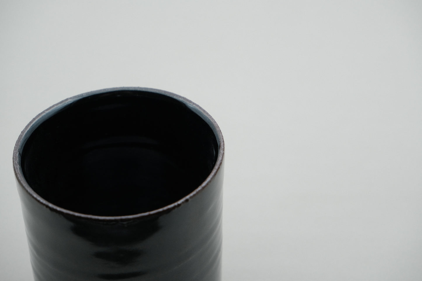 Azmaya Igayaki large straight teacup with a black glaze made at the Kōbo kiln in Mie