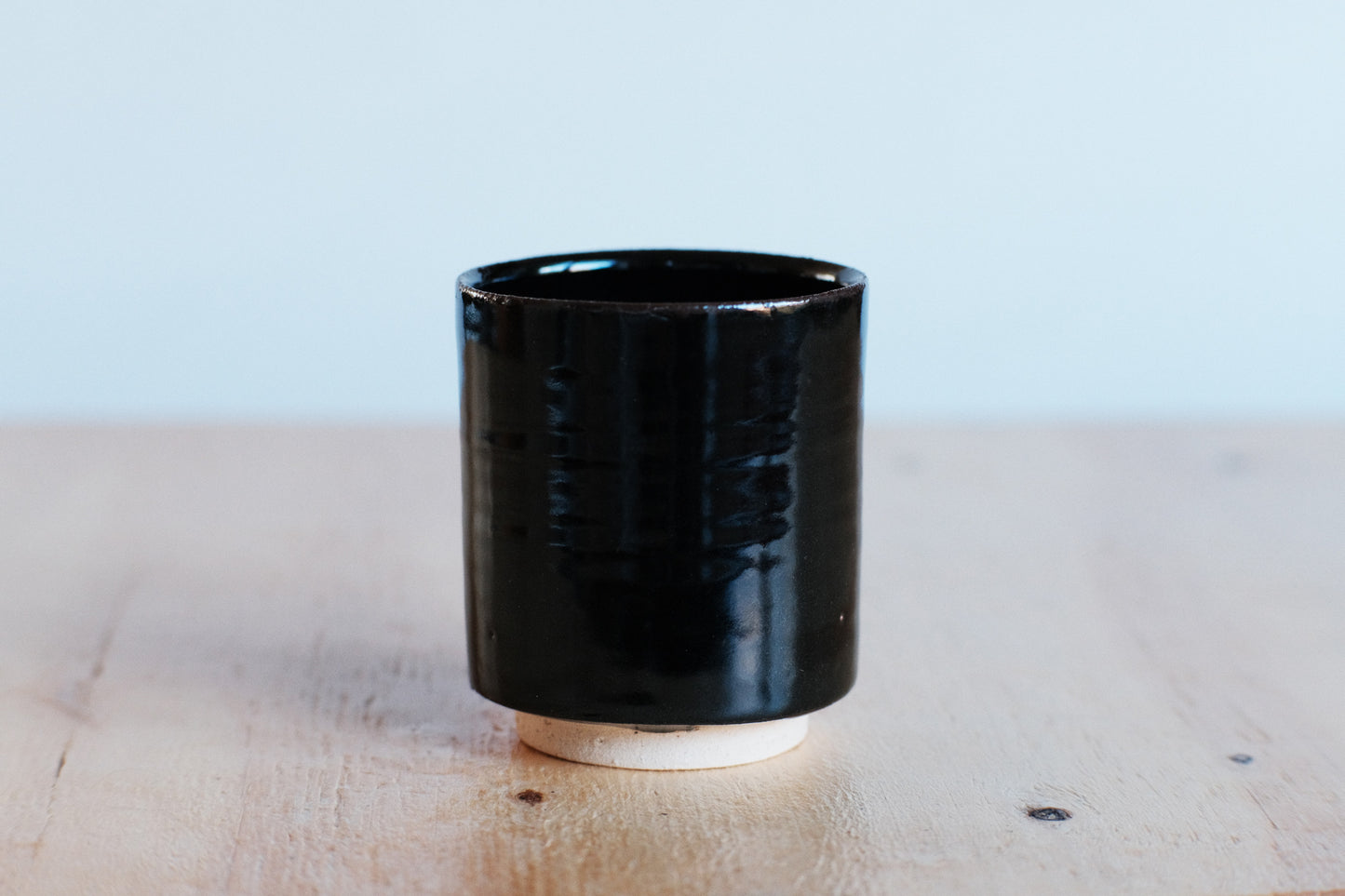 Azmaya Igayaki large straight teacup with a black glaze made at the Kōbo kiln in Mie