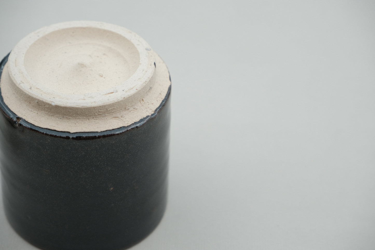 Azmaya Igayaki small straight teacup with a black glaze made at the Kōbo kiln in Mie