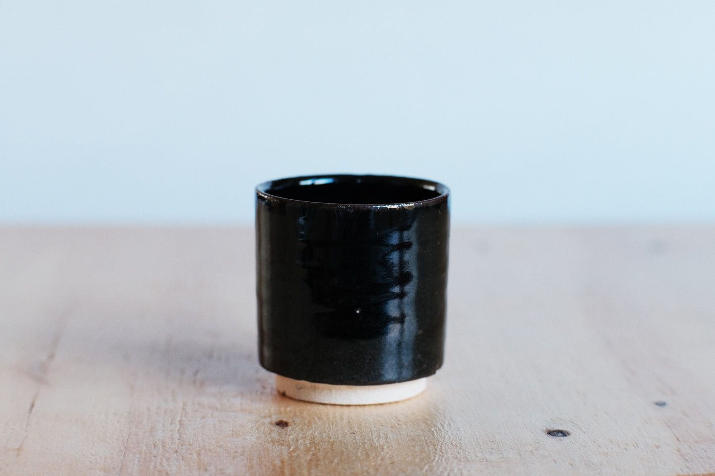Azmaya Igayaki small straight teacup with a black glaze made at the Kōbo kiln in Mie