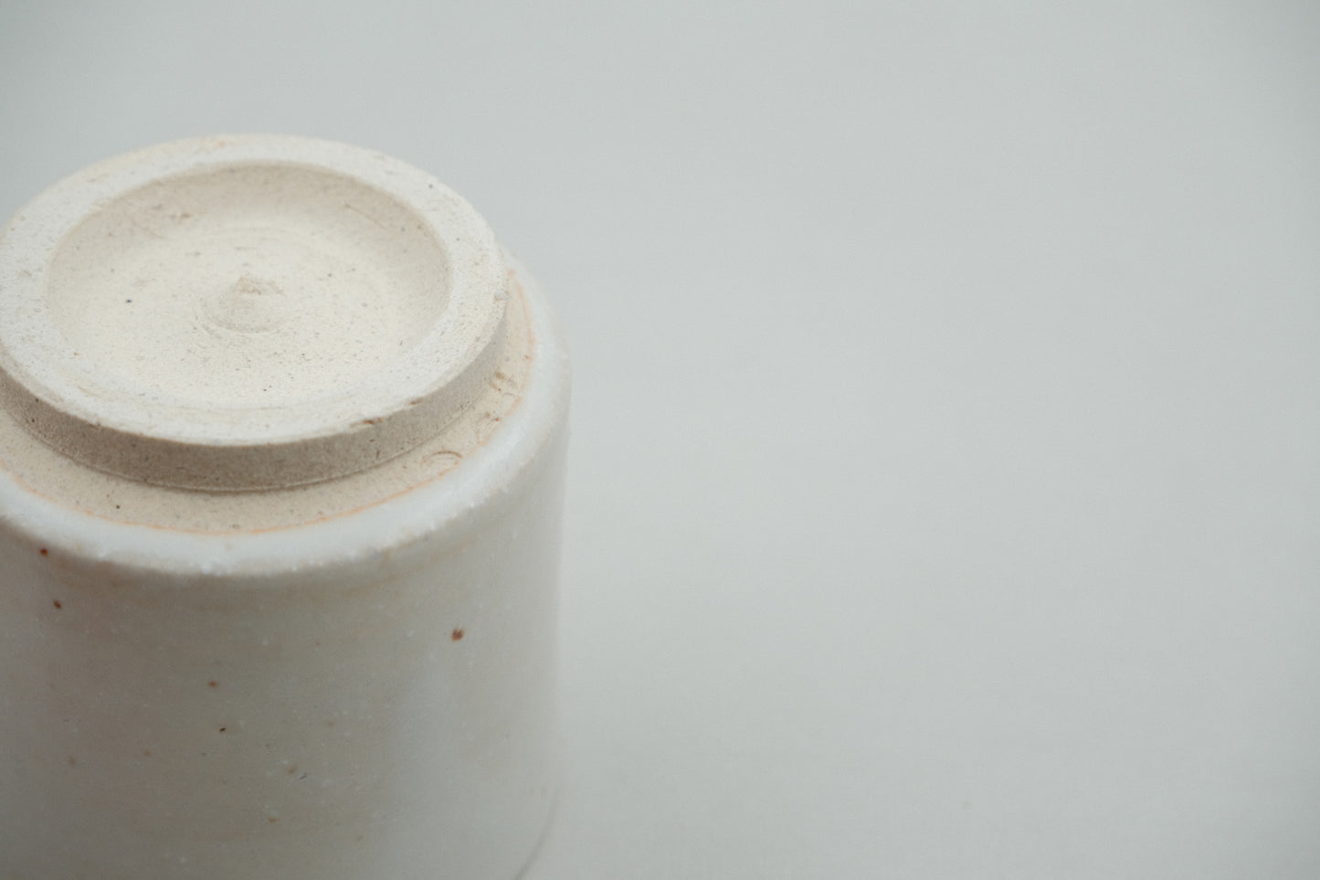 Azmaya Igayaki small straight teacup with a white glaze made at the Kōbo kiln in Mie