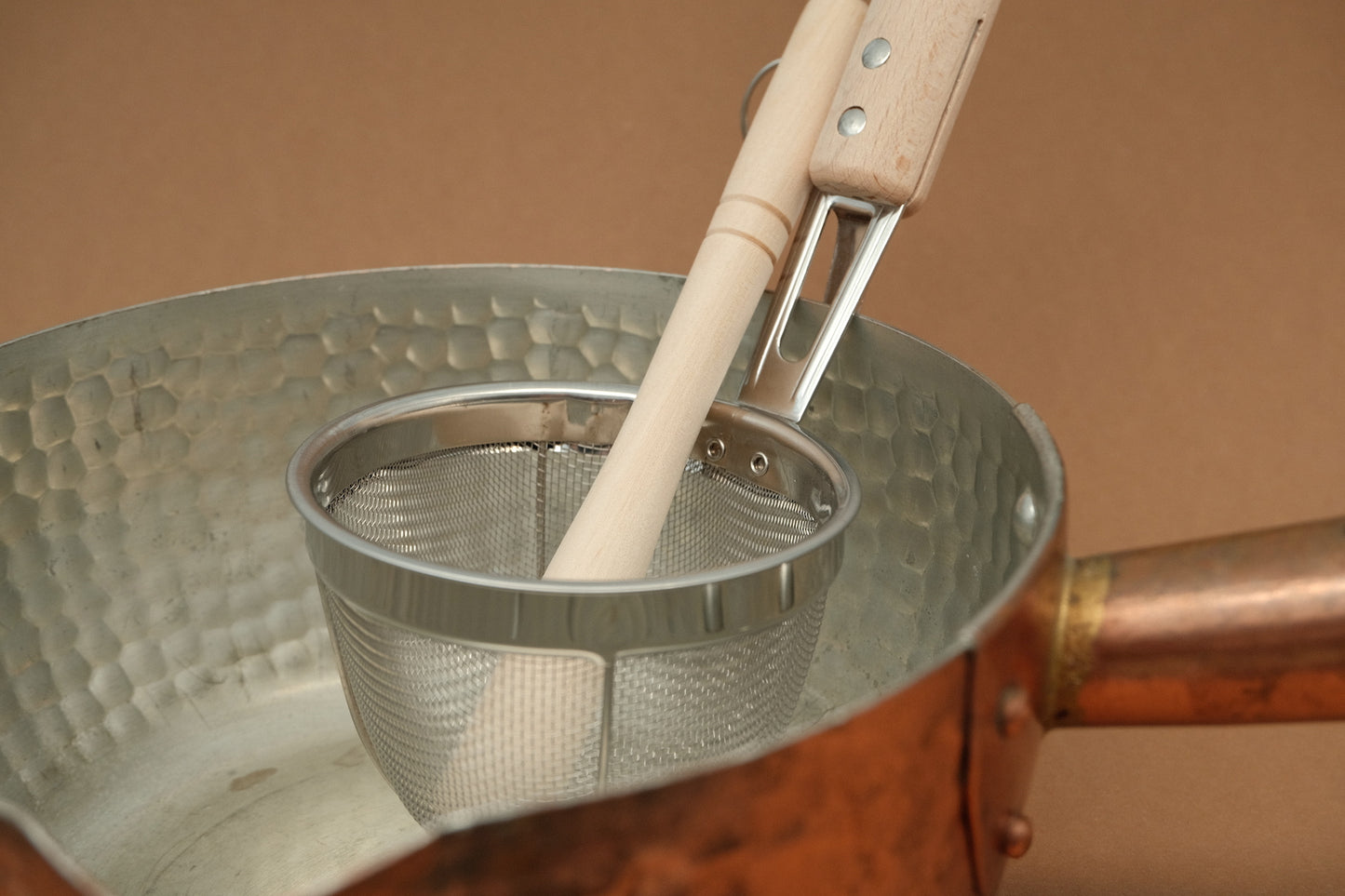 Stainless steel miso strainer with wooden handle and mudler