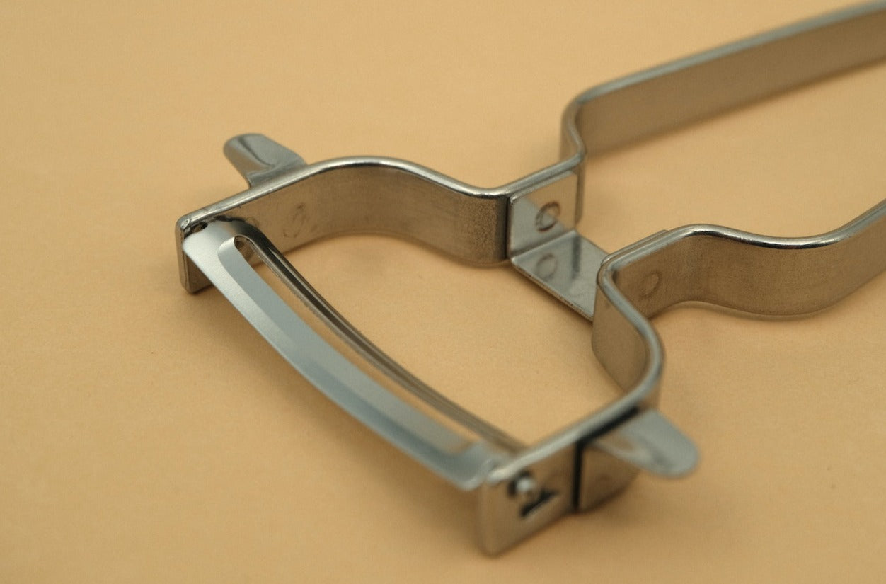 Stainless steel vegetable peeler