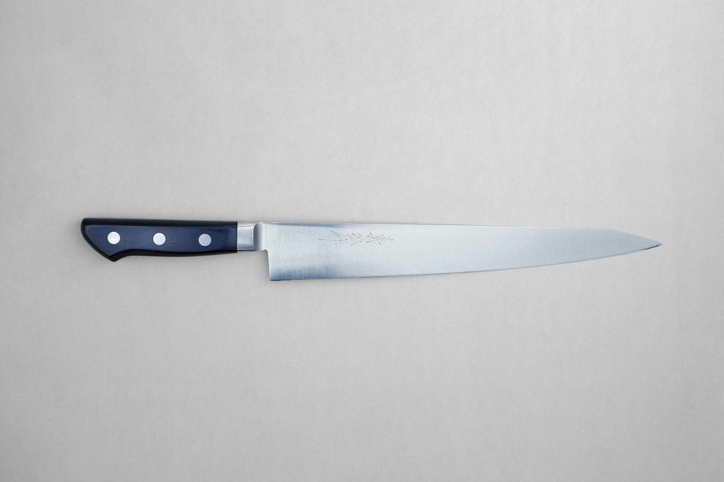 Yamawaki 8A roestvrij staal sujihiki 270 met een pakka handvat