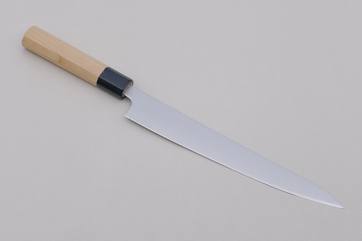 Yamawaki stainless clad aogami super sujihiki 240 with an octagonal ho wood and buffalo horn handle